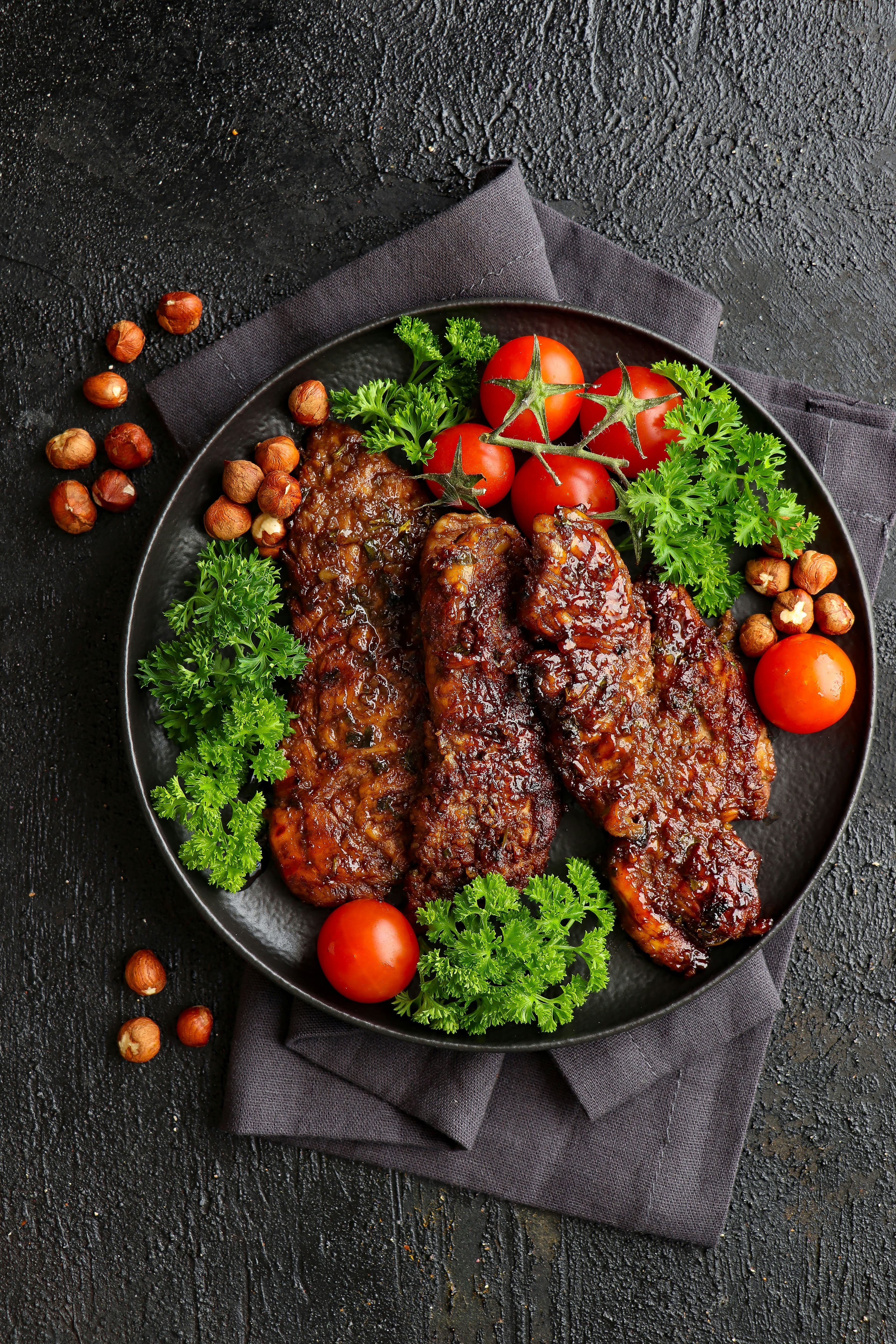 Kitchen line with chef plating desserts