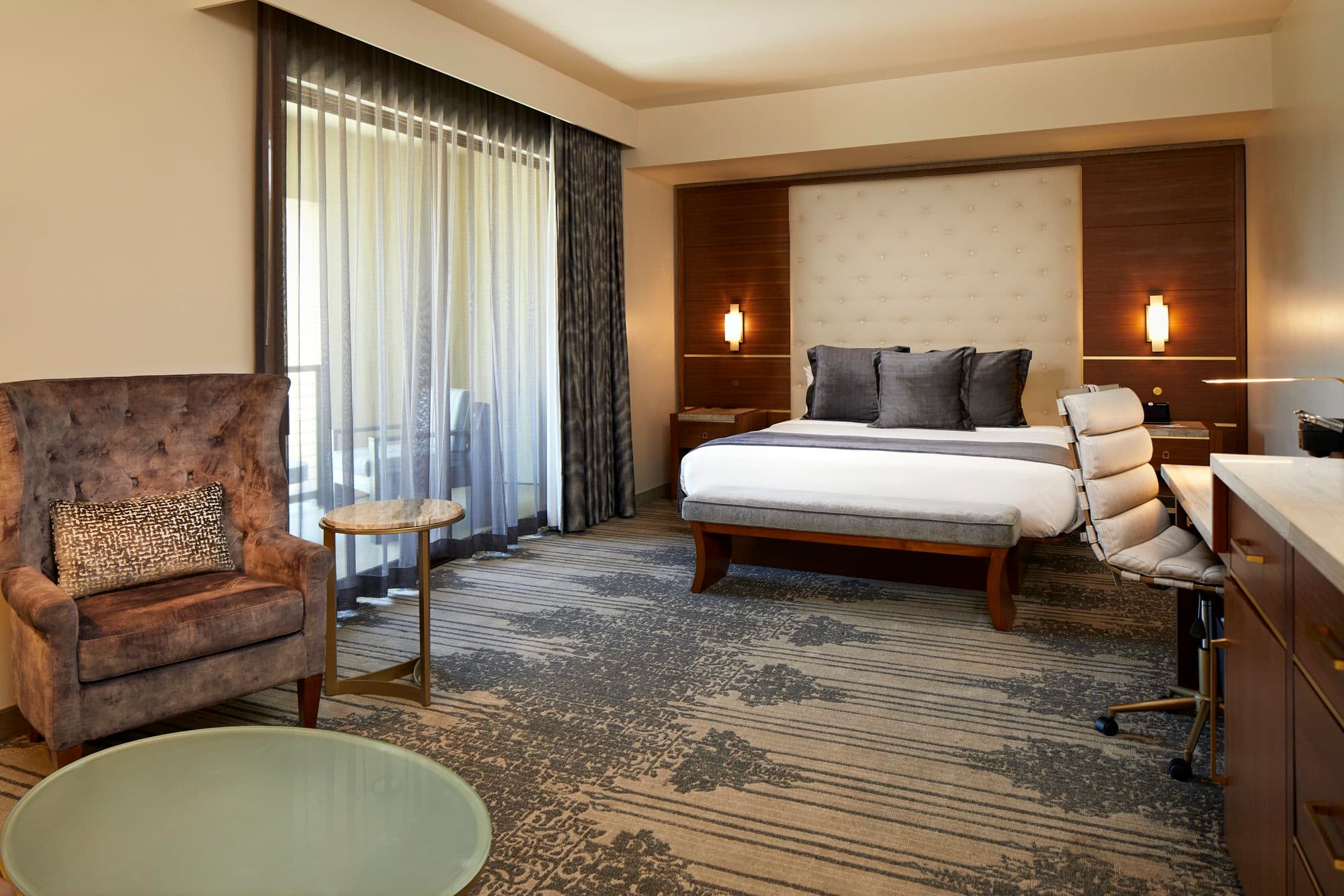 King suite with crisp linens and resort view